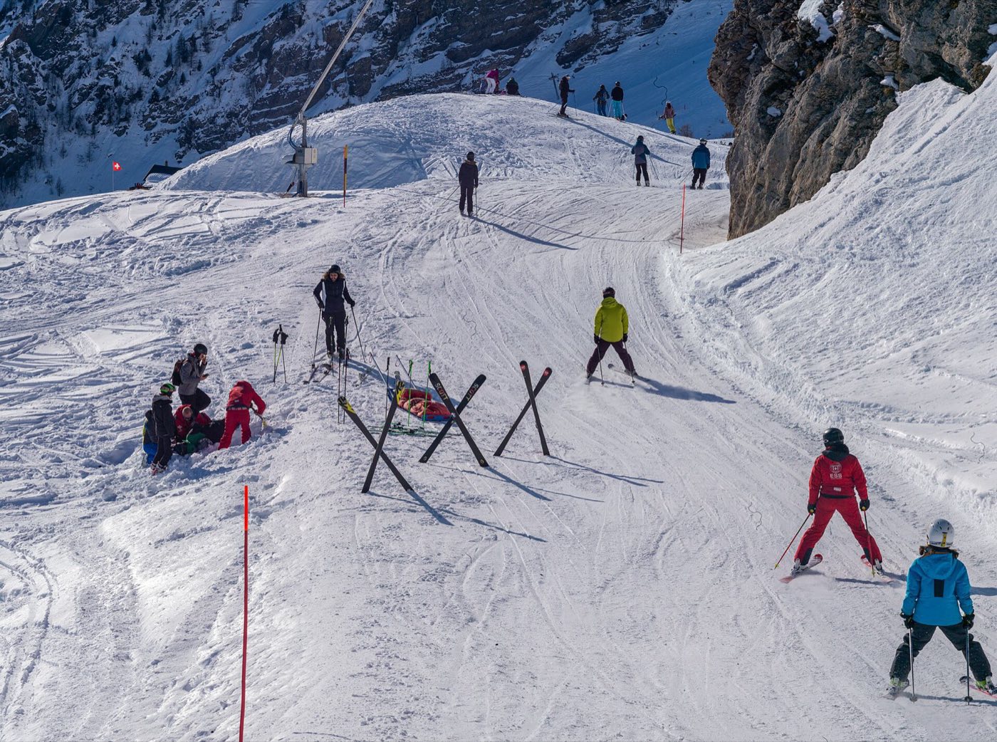 A ski patroller with a rescue toboggan