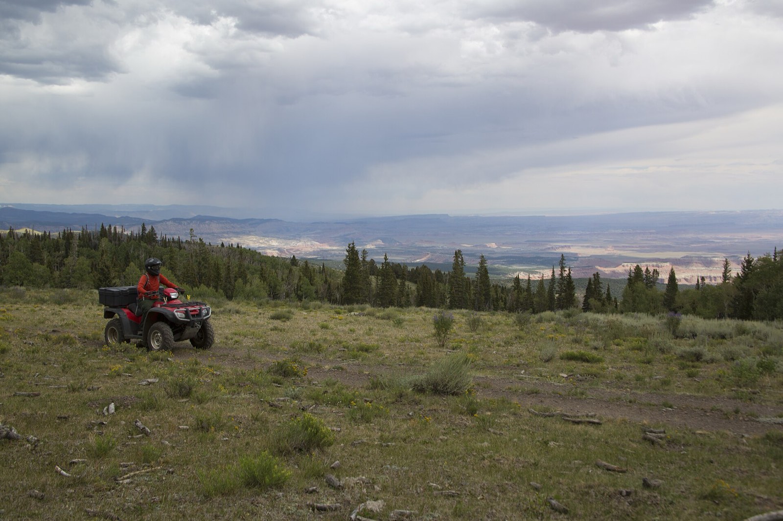 An ATV on a high mountain trail